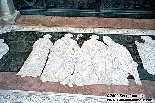 Closeup of the many figures drawn on the floor of the Duomo -- Siena, Italy